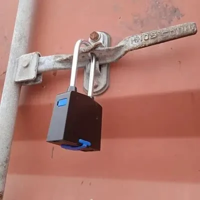 GPS Padlock v4 securing a container latch on site