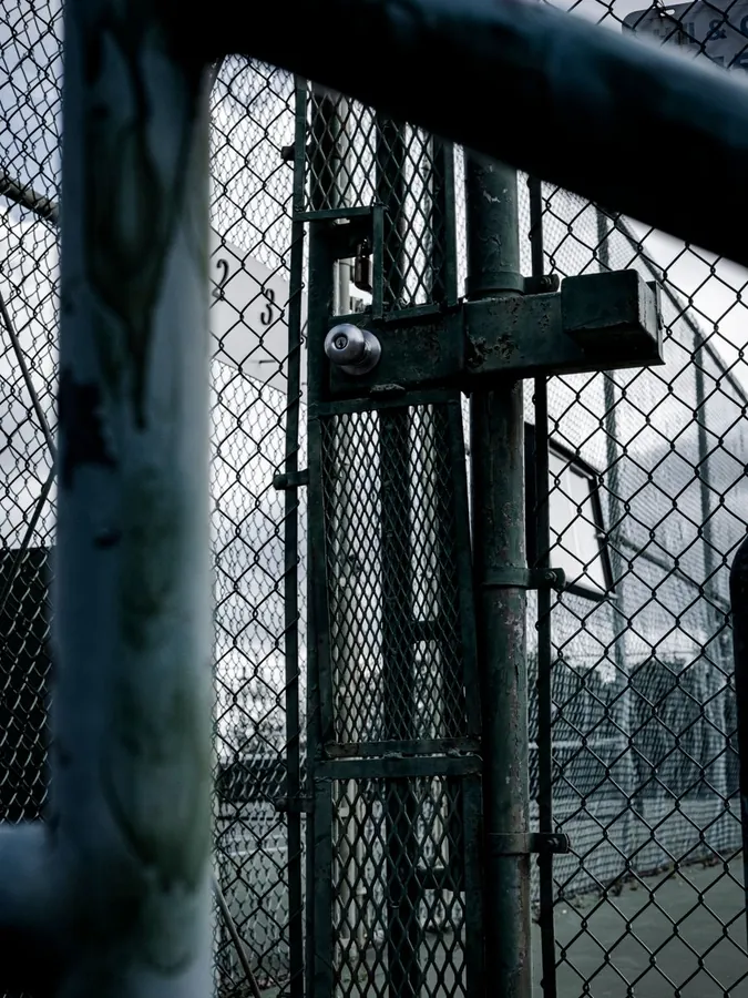 A locked chain-link security gate
